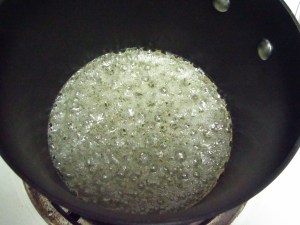 Sugar simmering on medium heat